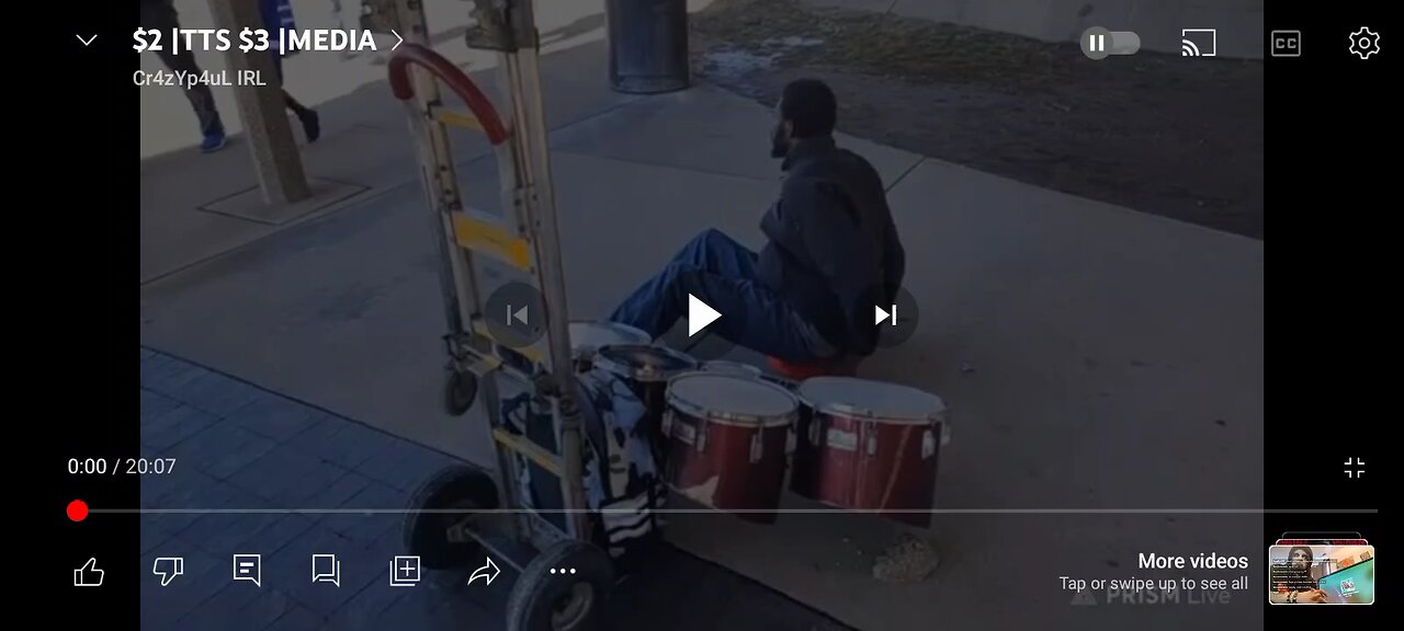 druggie daywalker watching a dude beat on the drums