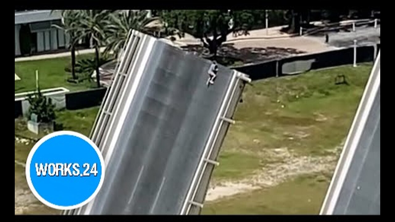 Man scales Florida drawbridge as onlookers watch the terrifying stunt |