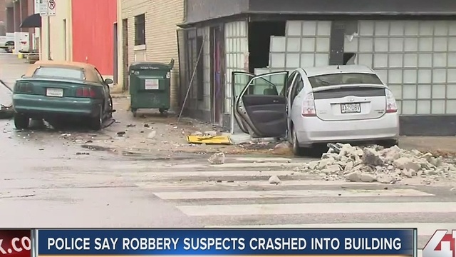 Car crashes into building in the Crossroads