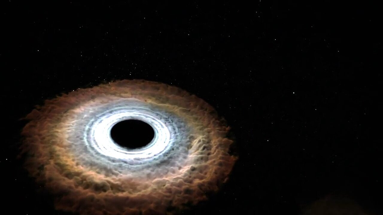 Massive Black Hole Shreds Passing Star