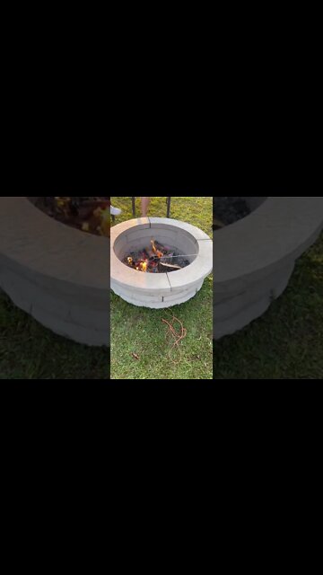 Cooking hotdogs over a fire