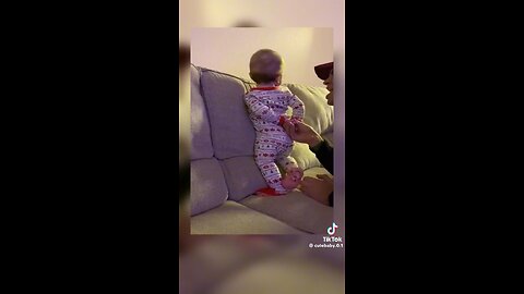 baby and dad playing funny videos