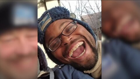 Loved ones, coworkers hold vigil for slain postal worker Aundre Cross