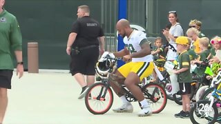 Traditional bike rides return for Packers training camp