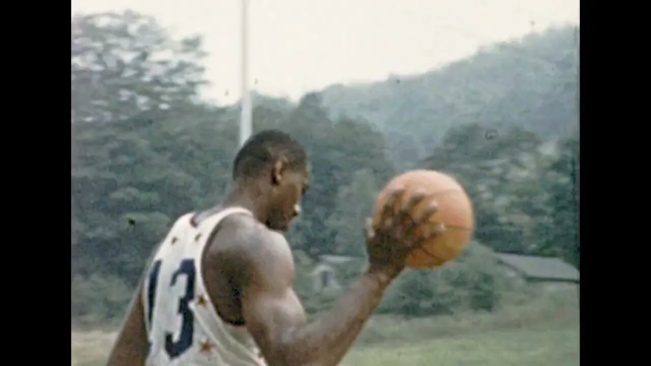 Wilt Chamberlain playing pick up in Philly. Circa 1960