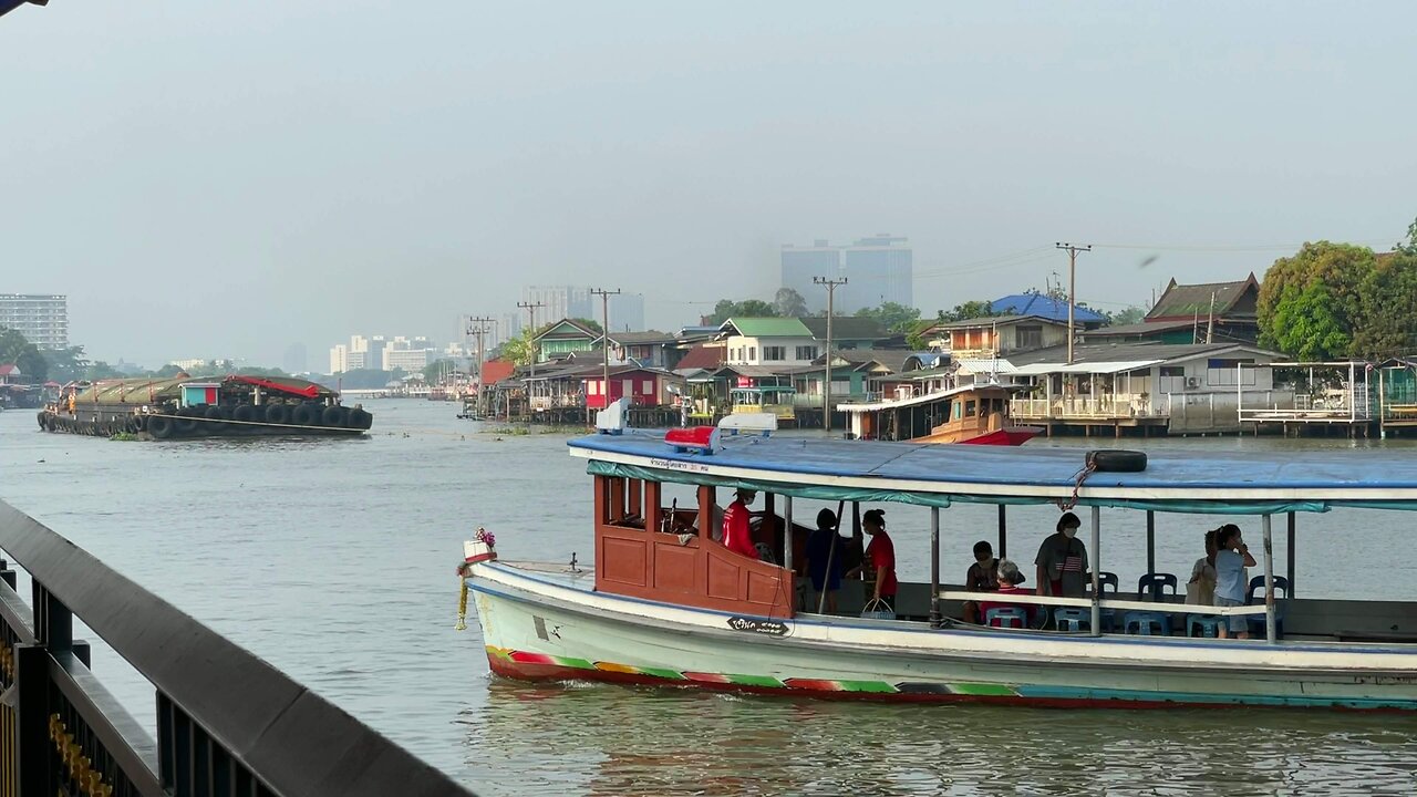 Barge and tugboats at Koh Kret Chao Phraya river in Thailand