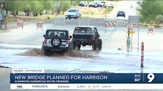 Bridge planned to remove flood threat