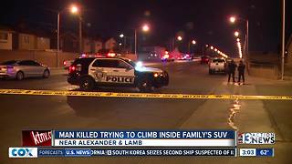 Man killed after trying to climb inside SUV