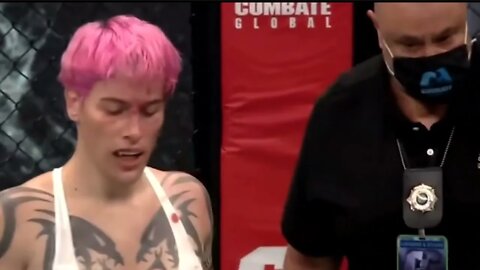 The Left Celebrates Male MMA Fighter Beating Up A Woman-is the individual with pink hair a woman?