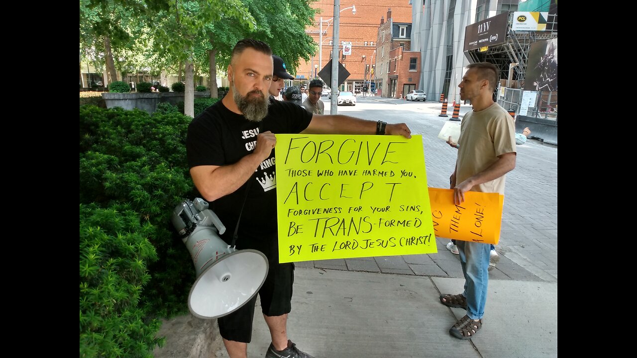 Brother Phil preaching outside dr@g qu33n story hour, June 3, 2023