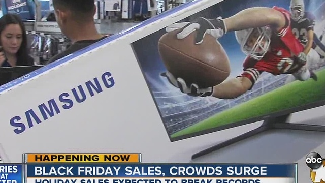 Black Friday sales, crowds surge