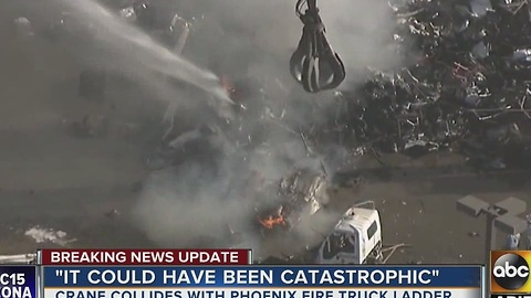 Smoke towers over Phoenix after scrap metal fire