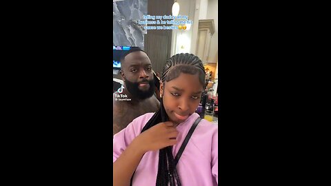 Rick Ross with kid