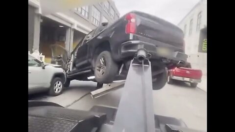 Man Steals The Tow Truck That Was Taking His SUV Away, Destroying His Ride And Several Other Cars