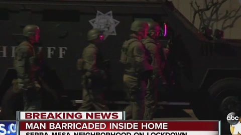 Man barricaded inside home