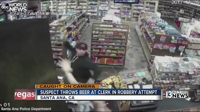 Man throwing beer cans at store clerk caught on camera