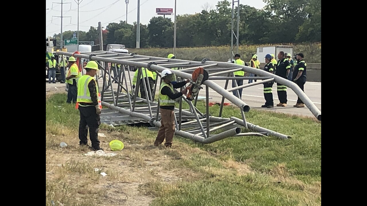 Driver killed after crash topples sign
