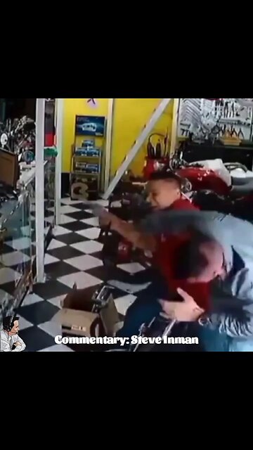 An armed robber takes a beating from his victim