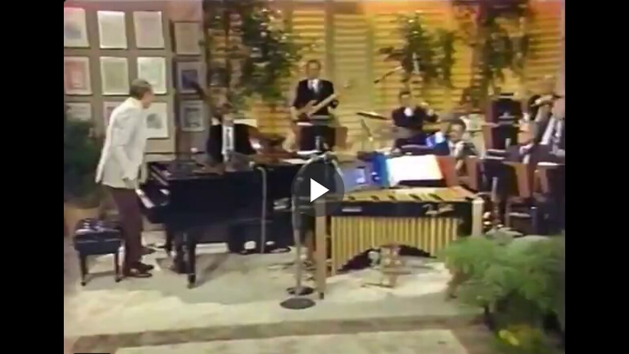 Henry Mancini plays the iconic "Pink Panther Theme" in 1983, with Plas Johnson...