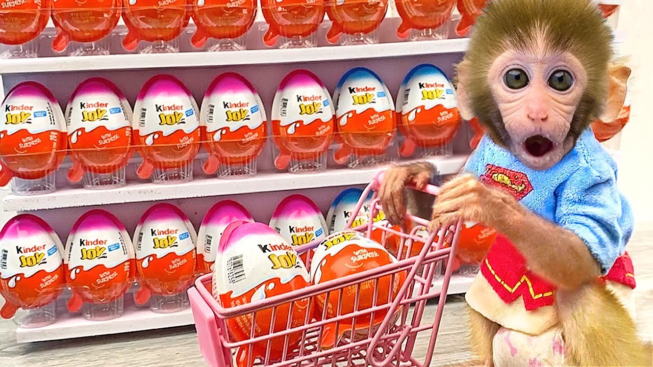 Monkey Baby Bon Bon doing shopping in Kinder Joy Egg store and eat chocolate with puppy