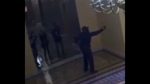 Photographers taking pictures of a fake J6 insurrection