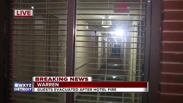 About 100 evacuated after fire at Warren hotel