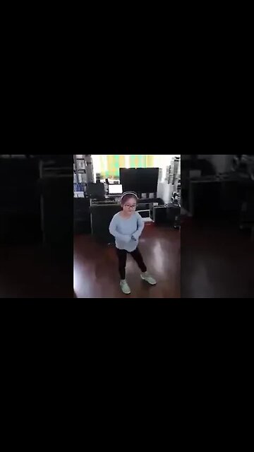 Baby girl dancing on "You are a Over comer"