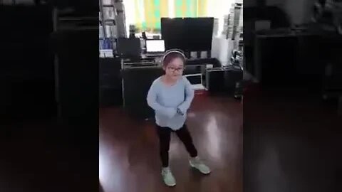 Baby girl dancing on "You are a Over comer"