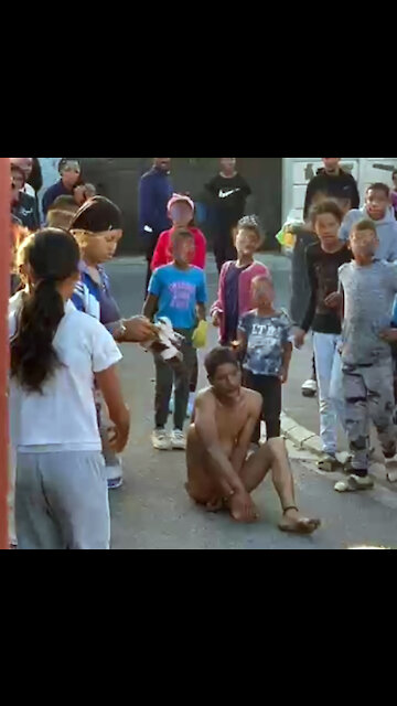 Aunties filmed bashing skollie with hammers