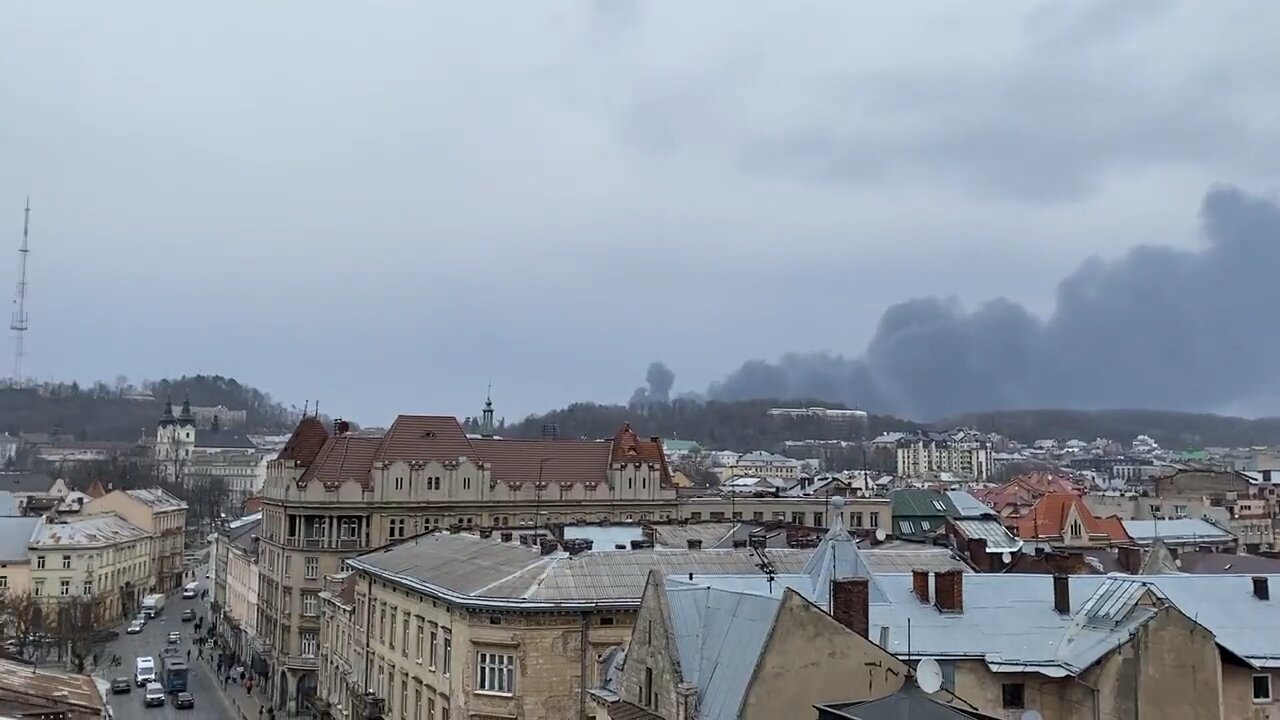 2 explosions and thick black smoke filling the skyline in Lviv after the air raid siren went off.