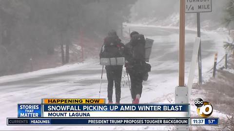Snowfall picking up amid winter blast