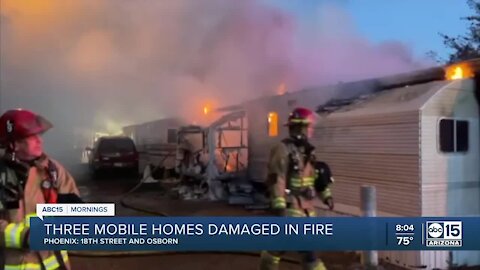 Three mobile homes catch fire Saturday near 16th St. and Osborn Rd.