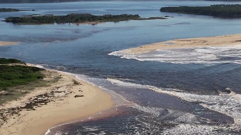 Bastion Point Mallacoota 11 March 2022 Lake in flood heading out to sea
