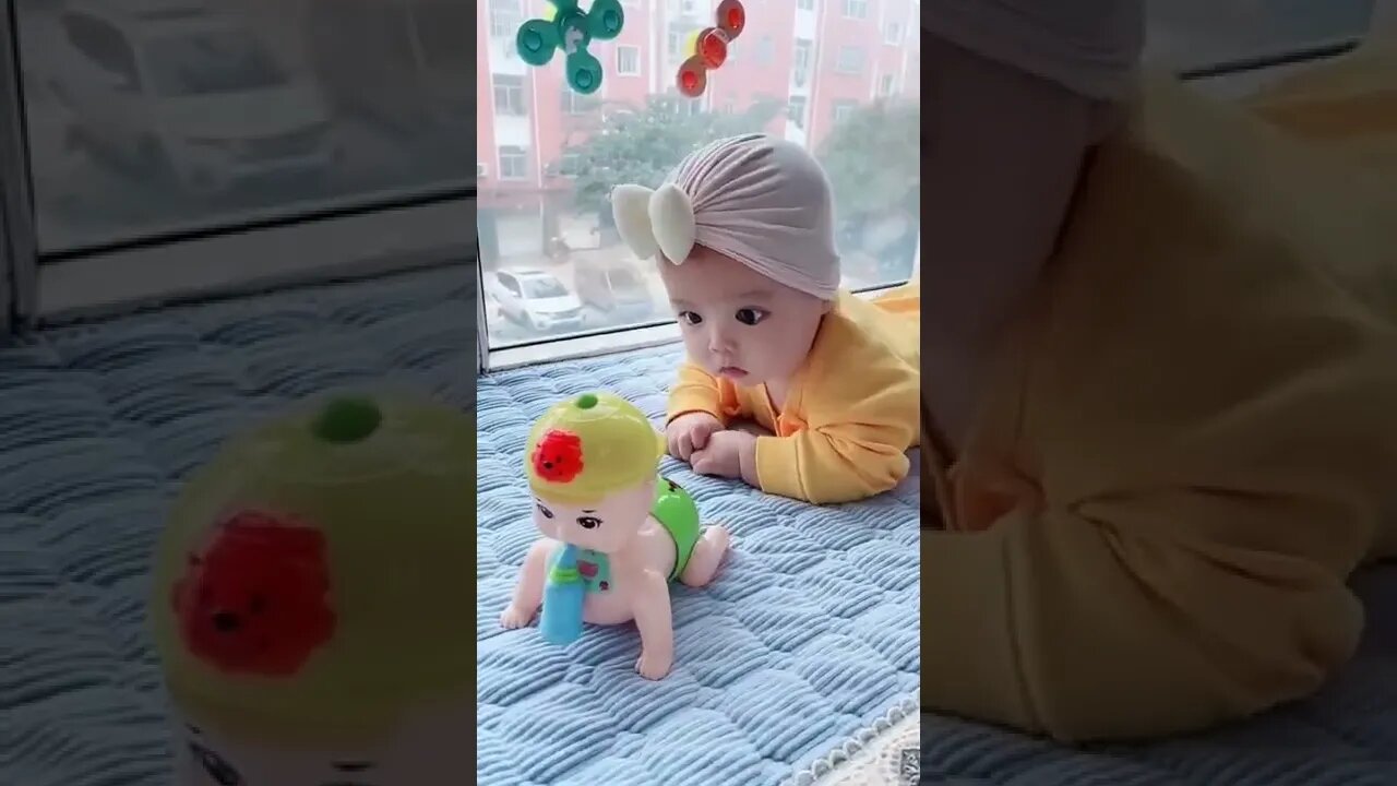 Cute baby playing toy