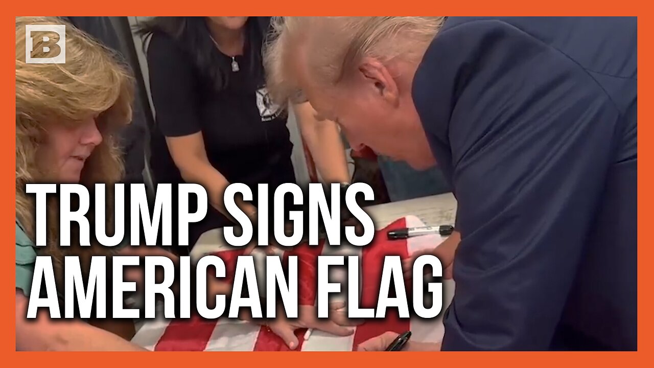 Trump Signs American Flag on Anniversary of 9/11