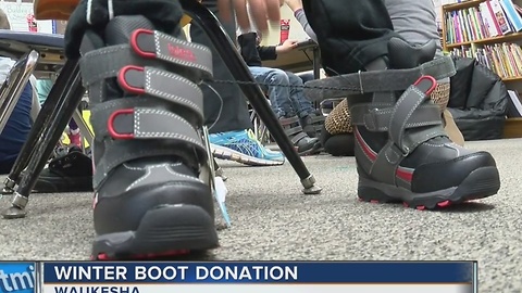 Meijer donates 400 pairs of boots to Waukesha school