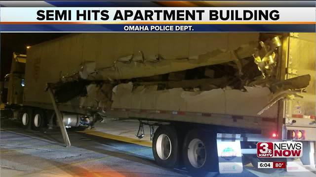 Semi truck hits apartment building on Pacific Street