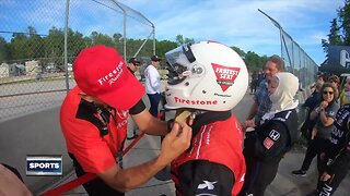 TODAY'S TMJ4's Delaney Brey sits passenger in an IndyCar