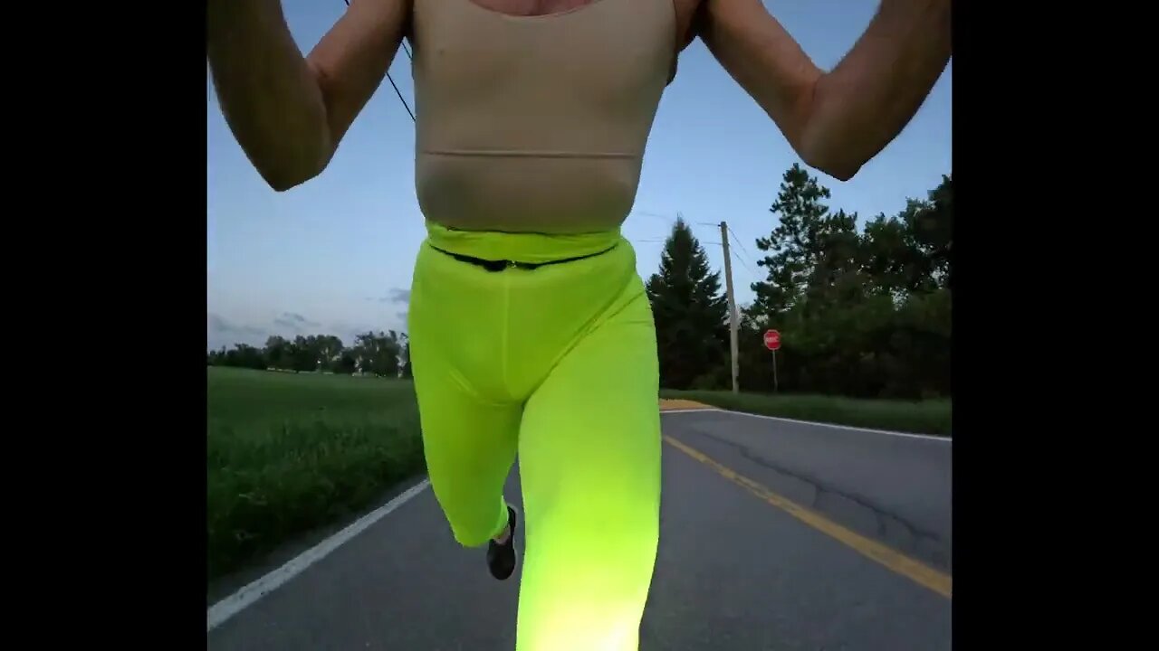 Early AM Scooter warmup before main strength workout day in triggering bright lime leggings LOL