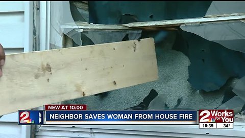 Neighbor saves woman from house fire