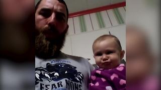 Baby Girl and Her Dad Blow Raspberries At Each Other