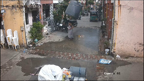 Woman Escapes Death, Injury After Water Tank Falls From Building… Lands Perfectly Around Her