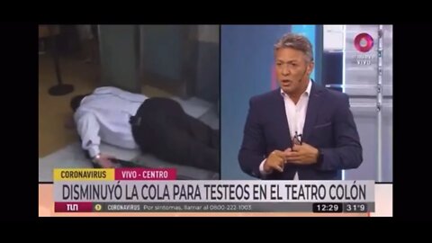 Argentinian Reporter Carlos Ferrara Collapses While Broadcasting From A COVID Testing Site