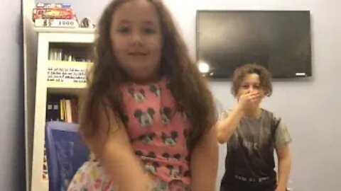 Brother Catches Sister Dancing