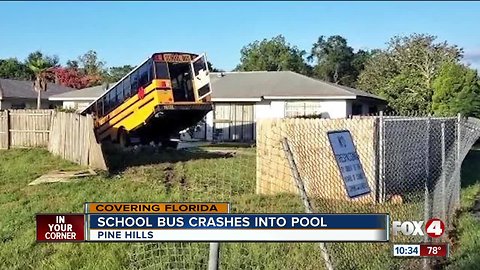 A school bus plunged into a pool after crash with Jeep