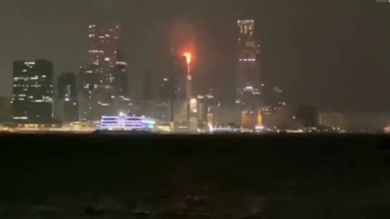 Flames tear through the night in Hong Kong, a skyscraper under construction is on fire