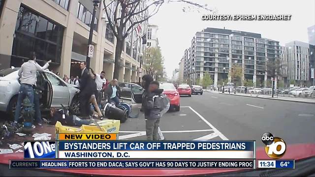 Bystanders lift car off trapped D.C. pedestrians