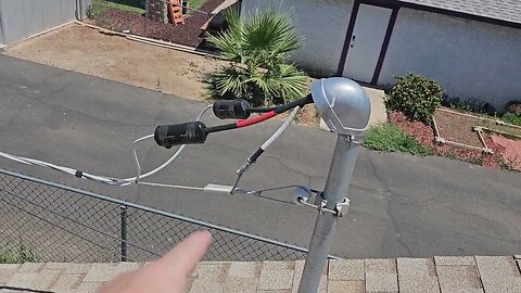 Electrical entrance wire for neighbor hangs over driveway