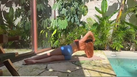 Refreshing morning yoga by the pool