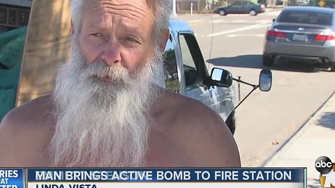 Man brings active bomb to fire station